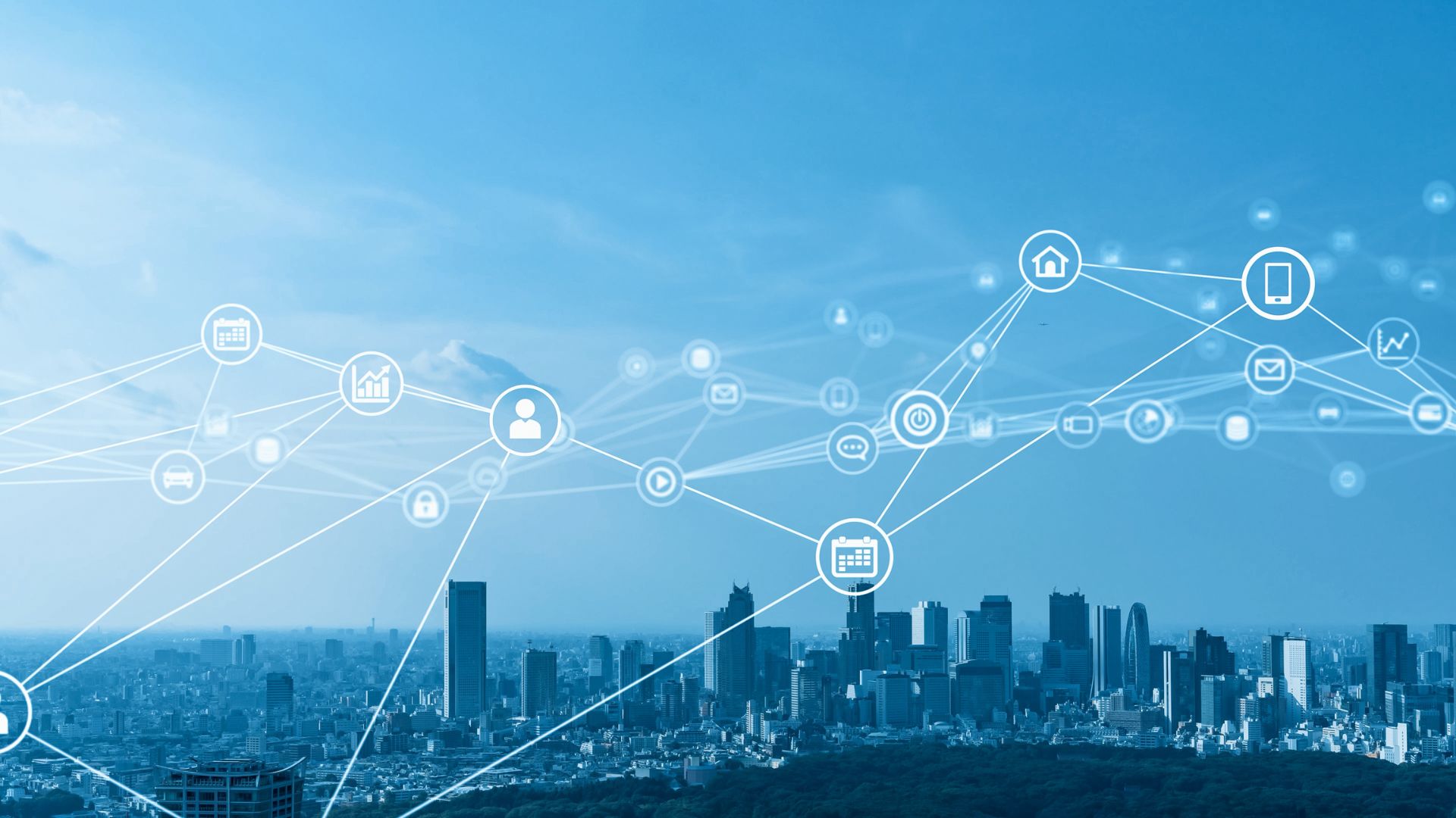 A digital image of technology icons connected by lines and dots overlaying a cityscape